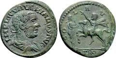 Roman Provincial Coins TROAS. Alexandria. Valerian I (253-260). Ae As. Obv: IMP LIC VALERIAИVS AVG. Laureate, draped and cuirassed bust right. Rev: COL AV / TRO. Valerian, raising hand, on horse reari