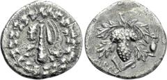 Greek Coins LYDIA. Tralleis. Cistophoric Drachm (Circa 166-67 BC). Obv: Lion skin draped over club; all within ivy wreath. Rev: TPAΛ. Grape bunch on vine. Control: Kantharos to right. SNG Copenhagen 6