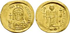 Byzantine Coins JUSTINIAN I (527-565). GOLD Solidus. Constantinople. Obv: D N IVSTINIANVS P P AVG. Helmeted and cuirassed bust facing, holding globus cruciger and shield with horseman motif. Rev: VICT