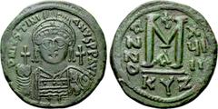 Byzantine Coins JUSTINIAN I (527-565). Follis. Cyzicus. Dated RY 18 (544/5). Obv: D N IVSTINIANVS P P AVG. Helmeted and cuirassed bust facing, holding globus cruciger and shield decorated with horsema