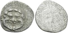 Greek Coins CILICIA. Uncertain. Tetartemorion (4th century BC). Obv: Facing gorgoneion. Rev: Blank. Göktürk -; SNG BN -; cf. SNG Levante 252 (hemitetartemorion; Kelenderis?); cf. CNG E-311, lot 820 (s