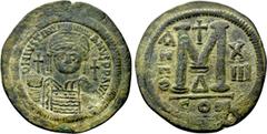 Byzantine Coins JUSTINIAN I (527-565). Follis. Constantinople. Dated RY 13 (539/40). Obv: D N IVSTINIANVS P P AVG. Helmeted and cuirassed bust facing, holding globus cruciger and shield decorated with