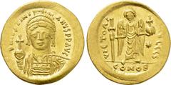 Byzantine Coins JUSTINIAN I (527-565). GOLD Solidus. Constantinople. Obv: D N IVSTINIANVS P P AVG. Helmeted and cuirassed bust facing, holding globus cruciger and shield decorated with horseman motif.