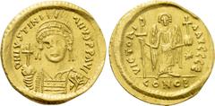 Byzantine Coins JUSTINIAN I (527-565). GOLD Solidus. Constantinople. Obv: D N IVSTINIANVS P P AVG. Helmeted and cuirassed bust facing, holding globus cruciger and shield decorated with horseman motif.