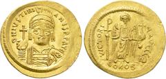 Byzantine Coins JUSTINIAN I (527-565). GOLD Solidus. Constantinople. Obv: D N IVSTINIANVS P P AVG. Helmeted and cuirassed bust facing, holding globus cruciger and shield decorated with horseman motif.