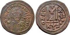 Byzantine Coins JUSTINIAN I (527-565). Follis. Cyzicus. Dated RY 19 (555/6). Obv: D N IVSTINIANVS P P AVG. Helmeted and cuirassed bust facing, holding globus cruciger and shield decorated with horsema