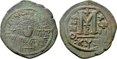 Byzantine Coins JUSTINIAN I (527-565). Follis. Cyzicus. Dated RY 18 (554/5). Obv: D N IVSTINIANVS P P AVG. Helmeted and cuirassed bust facing, holding globus cruciger and shield decorated with horsema