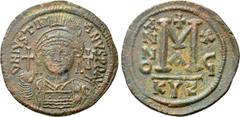 Byzantine Coins JUSTINIAN I (527-565). Follis. Cyzicus. Dated RY 16 (552/3). Obv: D N IVSTINIANVS P P AVG. Helmeted and cuirassed bust facing, holding globus cruciger and shield decorated with horsema