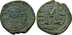 Byzantine Coins JUSTINIAN I (527-565). Follis. Nicomedia. Dated RY 18 (544/5). Obv: D N IVSTINIANVS P P AVG. Helmeted and cuirassed bust facing, holding globus cruciger and shield decorated with horse