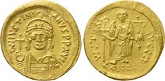 Byzantine Coins JUSTINIAN I (527-565). GOLD Solidus. Constantinople. Obv: D N IVSTINIANVS P P AVG. Helmeted and cuirassed bust facing, holding globus cruciger and shield decorated with horseman motif.