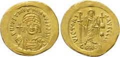 Byzantine Coins JUSTINIAN I (527-565). GOLD Solidus. Constantinople. Obv: D N IVSTINIANVS P P AVG. Helmeted and cuirassed bust facing, holding globus cruciger and shield decorated with horseman motif.