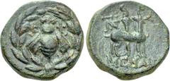 Greek Coins IONIA. Ephesos. Ae (Circa 50-27 BC). Menan-, magistrate. Obv: Bee within wreath. Rev: Stag standing right, head left; monogram to upper left, torch behind. SNG Copenhagen 346. Condition: V