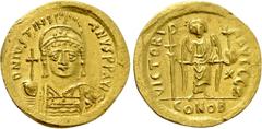 Byzantine Coins JUSTINIAN I (527-565). GOLD Solidus. Constantinople. Obv: D N IVSTINIANVS P P AVG. Helmeted and cuirassed bust facing, holding globus cruciger and shield decorated with horseman motif.