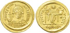 Byzantine Coins JUSTINIAN I (527-565). GOLD Solidus. Thessalonica. Obv: D N IVSTINIANVS P P AVG. Helmeted and cuirassed bust facing, holding globus cruciger and shield decorated with horseman motif. R
