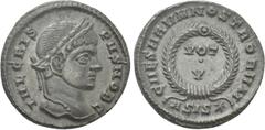 Roman Imperial Coins CRISPUS (Caesar, 316-326). Follis. Siscia. Obv: IVL CRISPVS NOB C. Laureate head right. Rev: CAESARVM NOSTRORVM. VOT / V in two lines within wreath; ASIS (star). RIC 161. Conditio