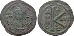 Byzantine Coins JUSTINIAN I (527-565). Half Follis. Cyzicus. Dated RY 12 (538/9). Obv: D N IVSTINIANVS P P AVG. Helmeted and cuirassed bust facing, holding globus cruciger and shield; cross to right. 