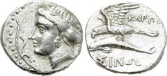 Greek Coins PAPHLAGONIA. Sinope. Drachm (Circa 330-300 BC). Karpo-, magistrate. Obv: Head of nymph left, with hair in sakkos; aplustre to left. Rev: ΚΑΡΠΟ / ΣINΩ. Sea-eagle standing left, with wings s