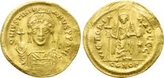 Byzantine Coins JUSTINIAN I (527-565). GOLD Solidus. Thessalonica. Obv: D N IVSTINIANVS P P AVG. Helmeted and cuirassed bust facing, holding globus cruciger and shield decorated with horseman motif. R