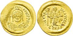 Byzantine Coins JUSTINIAN I (527-565). GOLD Solidus. Constantinople. Obv: D N IVSTINIANVS P P AVG. Helmeted and cuirassed bust facing, holding globus cruciger and shield decorated with horseman motif.