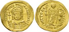 Byzantine Coins JUSTINIAN I (527-565). GOLD Solidus. Constantinople. Obv: D N IVSTINIANVS P P AVG. Helmeted and cuirassed bust facing, holding globus cruciger and shield decorated with horseman motif.