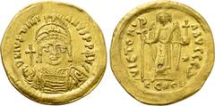Byzantine Coins JUSTINIAN I (527-565). GOLD Solidus. Constantinople. Obv: D N IVSTINIANVS P P AVG. Helmeted and cuirassed bust facing, holding globus cruciger and shield decorated with horseman motif.