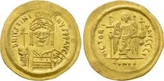 Byzantine Coins JUSTINIAN I (527-565). GOLD Solidus. Ravenna. Obv: D N IVSTINIANVS P P AVG. Helmeted and cuirassed bust facing, holding globus cruciger and shield decorated with horseman motif. Rev: V