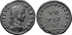 Roman Imperial Coins CRISPUS (Caesar, 316-326). Follis. Arelate. Obv: CRISPVS NOB CAES. Laureate head right. Rev: CAESARVM NOSTRORVM. VO / TIS / V in three lines; TA. RIC 220. Condition: Good very fin