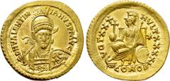 Roman Imperial Coins VALENTINIAN III (425-455). GOLD Solidus. Constantinople. Obv: D N VALENTINIANVS P F AVG. Helmeted and cuirassed bust facing slightly right, holding spear and shield decorated with