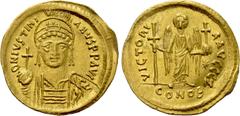 Byzantine Coins JUSTINIAN I (527-565). GOLD Solidus. Constantinople. Obv: D N IVSTINIANVS P P AVG. Helmeted and cuirassed bust facing, holding globus cruciger and shield decorated with horseman motif.
