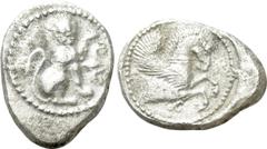Greek Coins DYNASTS OF LYCIA. Amm... (Circa 480-460 BC). Stater. Uncertain mint. Obv: Lion seated right, raising forepaw; floral scroll to right. Rev: Forepart of Pegasos right within pelleted circula