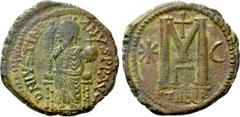 Byzantine Coins JUSTINIAN I (527-565). Follis. Antioch. Obv: DN IVSTINIANVS PP AVG. Justinian enthroned facing, holding long sceptre and globe cruciger. Rev: Large M between star and crescent; above, 