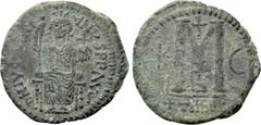 Byzantine Coins JUSTINIAN I (527-565). Follis. Antioch. Obv: DN IVSTINIANVS PP AVG. Justinian enthroned facing, holding long sceptre and globe cruciger. Rev: Large M between star and crescent; above, 