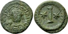 Byzantine Coins JUSTINIAN I (527-565). Decanummium. Rome. Obv: D N IVSTINIANVS P AVG. Helmeted and cuirassed bust facing, holding globus cruciger and shield decorated with horseman motif. Rev: Large I