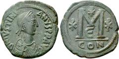 Byzantine Coins JUSTINIAN (527-565). Follis. Constantinople. Obv: D N IVSTINIANVS P P AVG. Diademed, draped and cuirassed bust right, with star on shoulder. Rev: Large M; Chi-Rho to left, above and to