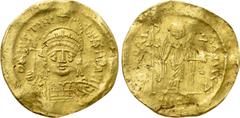 Byzantine Coins JUSTINIAN I (527-565). GOLD Solidus. Constantinople. Obv: D N IVSTINIANVS P P AVG. Helmeted and cuirassed bust facing, holding globus cruciger and shield decorated with horseman motif.