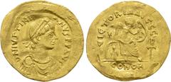 Byzantine Coins JUSTINIAN I (527-565). GOLD Semissis. Constantinople. Obv: D N IVSTINIANVS P P AVG. Diademed, draped and cuirassed bust right. Rev: VICTORIA AVGGG / CONOB. Victory seated right on shie
