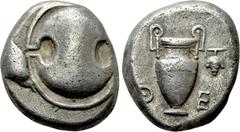 Greek Coins BOEOTIA. Thebes. Stater (425-400 BC). Obv: Boeotian shield. Rev: ΘE. Amphora. Controls: grape in right field. BCD Boeotia 398. Condition: Very fine. Weight: 12.13 g. Diameter: 21 mm.