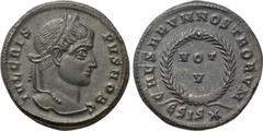 Roman Imperial Coins CRISPUS (Caesar, 316-326). Follis. Siscia. Obv: IVL CRISPVS NOB C. Laureate head right. Rev: CAESARVM NOSTRORVM / ESIS (star). VOT / V in two lines within wreath. RIC 161. Conditi