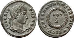 Roman Imperial Coins CRISPUS (Caesar, 316-326). Follis. Siscia. Obv: IVL CRISPVS NOB C. Laureate head right. Rev: CAESARVM NOSTRORVM / ASIS (star). VOT / X in two lines within wreath. RIC 165. Conditi