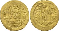 Byzantine Coins JUSTINIAN I (527-565). GOLD Solidus. Constantinople. Obv: D N IVSTINIANVS P P AVG. Helmeted and cuirassed bust facing, holding globus cruciger and shield decorated with horseman motif.
