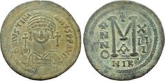 Byzantine Coins JUSTINIAN I (527-565). Follis. Nicomedia. Dated RY 13 (539/40). Obv: D N IVSTINIANVS P P AVG. Helmeted and cuirassed bust facing, holding globus cruciger and shield decorated with hors