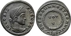 Roman Imperial Coins CRISPUS (Caesar, 316-326). Follis. Siscia. Obv: IVL CRISPVS NOB C. Laureate head right. Rev: CAESARVM NOSTRORVM / ASIS (star). VOT / V in two lines within wreath. RIC 161. Conditi