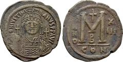 Byzantine Coins JUSTINIAN I (527-565). Follis. Constantinople. Dated RY 8 (544/545). Obv: D N IVSTINIANVS P P AVG. Helmeted and cuirassed bust facing, holding globus cruciger and shield decorated with