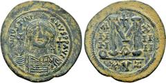Byzantine Coins JUSTINIAN I (527-565). Follis. Cyzicus. Dated RY 14 (550/51). Obv: D N IVSTINIANVS P P AVG. Helmeted and cuirassed bust facing, holding globus cruciger and shield decorated with horsem