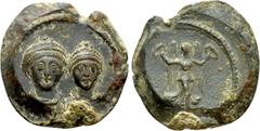 Roman Imperial Coins ROMAN EMPIRE. Imperial lead seal. Honorius, with Theodosius II (408-423). Obv: Diademed and draped bust of Honorius and Theodosius II. Rev: Victory advancing right, head left, hol