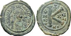 Byzantine Coins JUSTINIAN I (527-565). Half Follis. Nicomedia. Dated RY 17 (543/4). Obv: D N IVSTINIANVS P P AVG. Helmeted and cuirassed bust facing, holding globus cruciger and shield decorated with 
