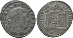 Roman Imperial Coins MAXENTIUS (307-312). Follis. Aquileia. Obv: IMP C MAXENTIVS P F AVG. Laureate head right. Rev: CONSERV VRB SVAE / AQΓ. Tetrastyle temple, with Lupa Romana and twins in pediment an
