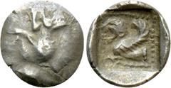 Greek Coins GREEKS. Uncertain (Lycia?). Tetartemorion (4th century BC). Obv: Forepart of boar left. Rev: Forepart of roaring, winged lion left. Unrecorded in standard references. Very rare Condition: 