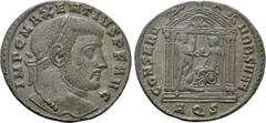 Roman Imperial Coins MAXENTIUS (307-312). Follis. Aquileia. Obv: IMP C MAXENTIVS P F AVG. Laureate head right. Rev: CONSERV VRB SVAE / AQS. Hexastyle temple, containing Roma seated left on throne, hol
