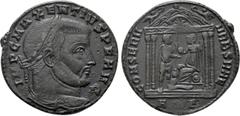 Roman Imperial Coins MAXENTIUS (307-312). Follis. Aquileia. Obv: IMP C MAXENTIVS P F AVG. Laureate head right. Rev: CONSERV VRB SVAE / AQ Γ. Roma seated left on shield, holding spear and presenting gl